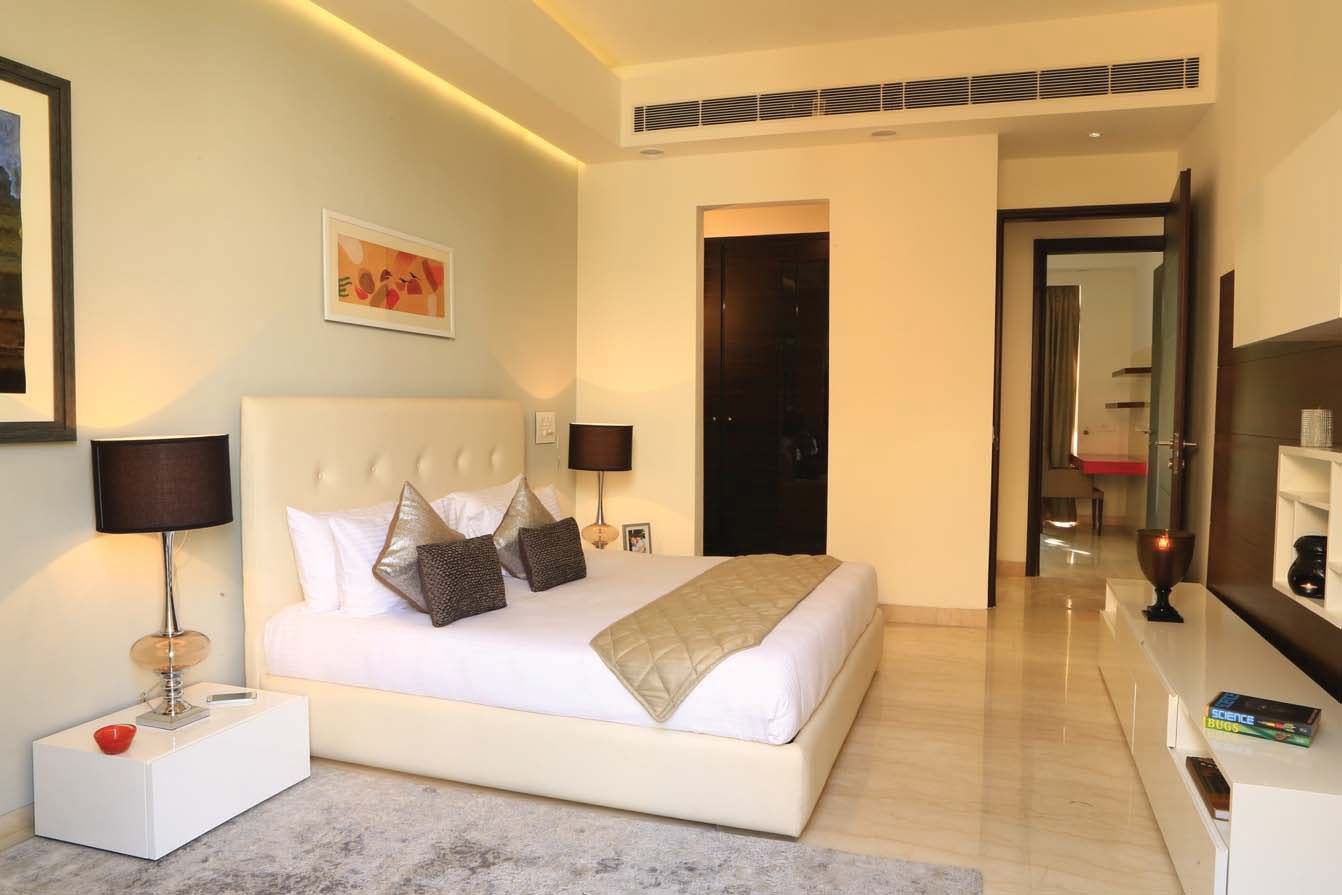Master bedroom with marble flooring