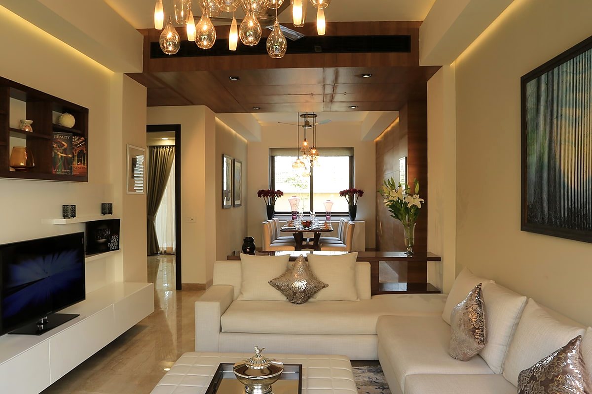Living room with chandelier and marble floors