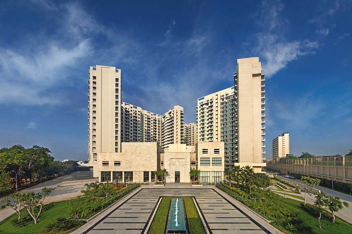The entrance drive and water channel leading to the towers (actual image)